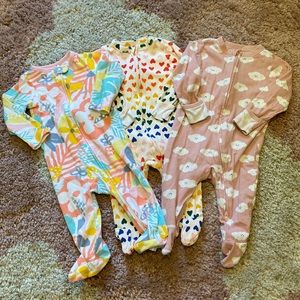 Set of three zippered footed onesies